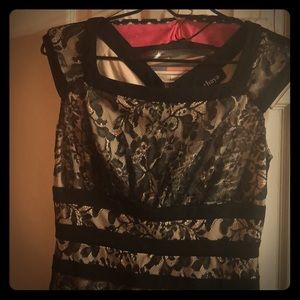 Vintage cocktail black lace and sand color.